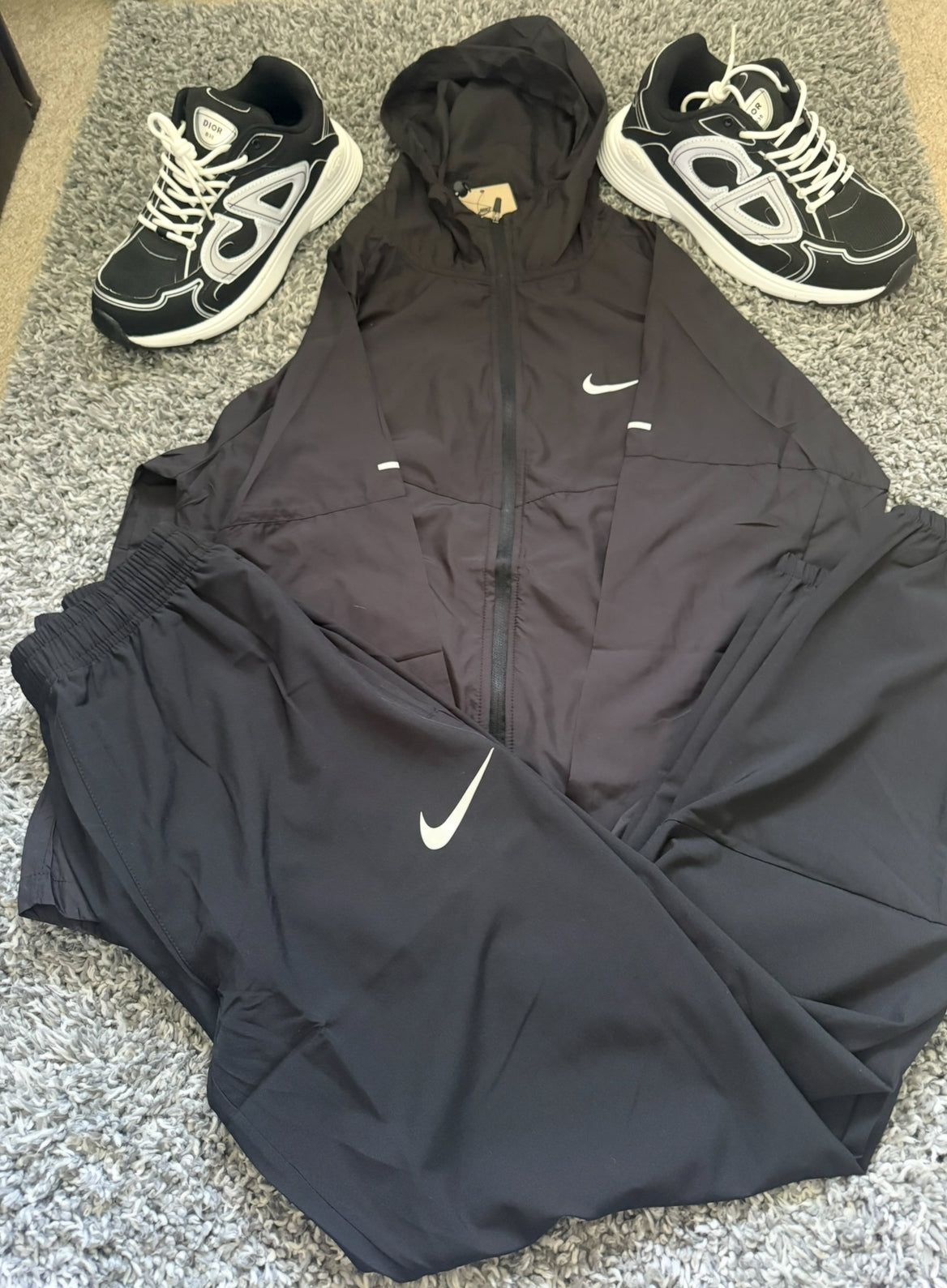 Black Swoosh Miller